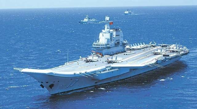 山東艦與殲-15艦載機，中國海軍力量的新里程碑，中國海軍新里程碑，山東艦與殲-15艦載機的強強聯(lián)合